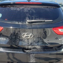 Left a vertical line of dirt on the back of my car. Stay far away from this evil money stealing company!