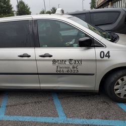 State Taxi - If you zoom in he is digging in to his breakfast guess he wanted to give his "handicapped grandma" space .
