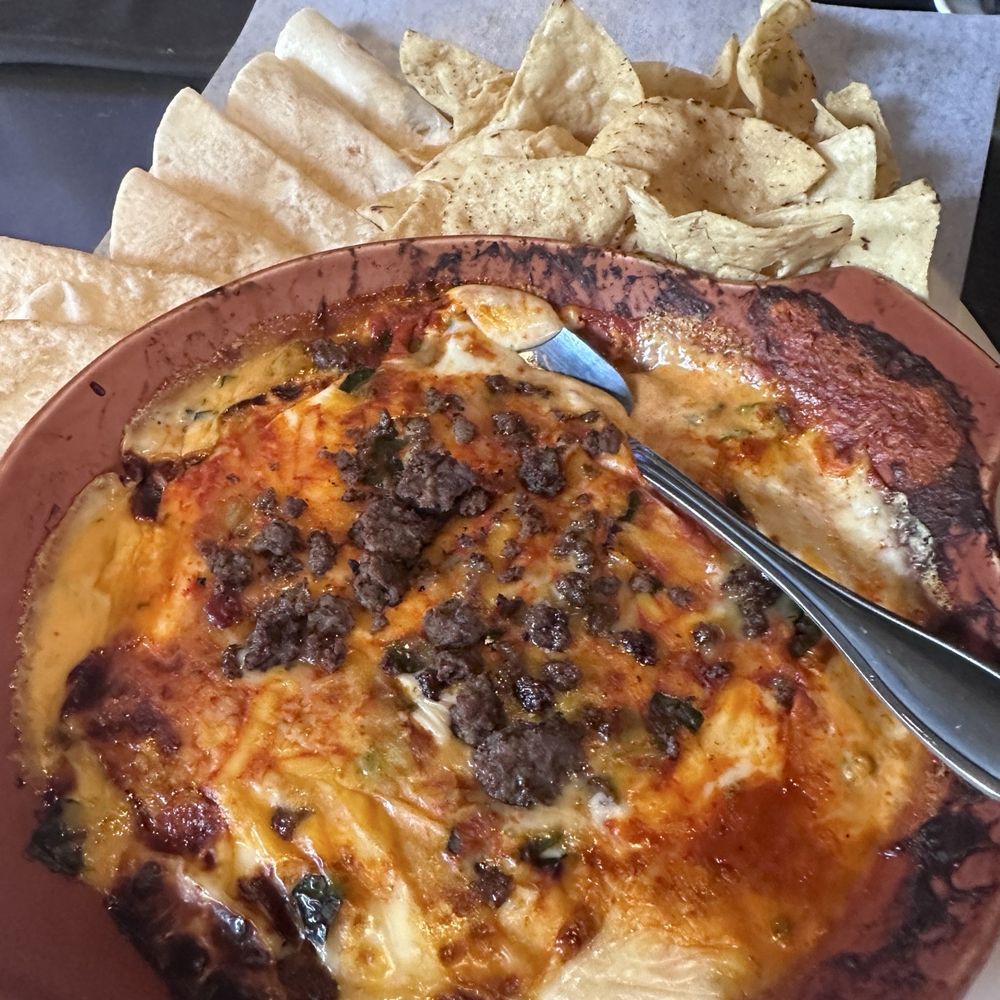 Yard House - Miguel's Queso Dip with seasoned beef - New American Near Me - Carlsbad, California Yard House - Miguel's Queso Dip with seasoned beef - New American Near Me - Carlsbad, California