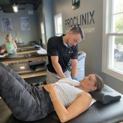 ProClinix Sports Physical Therapy & Chiropractic - Dr Stephen Grunbok, PT, DPT doing shoulder manual techniques to address pain and mobility
