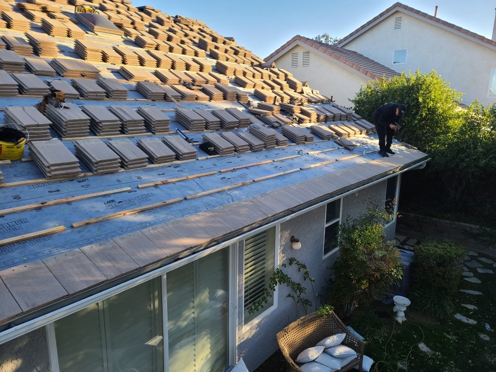 Slide of Novotny Roofing Inc