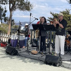Point San Luis Lighthouse - I forget her name, but she played the flute and the sax. She was fantastic. She is married to Jamal who works at CAL Paula.
