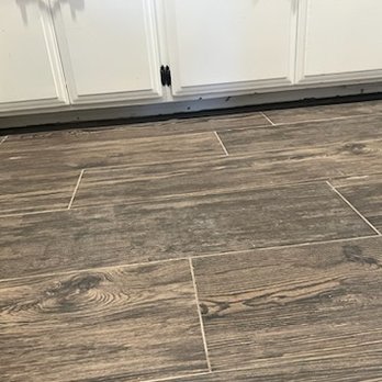 Fair Price Carpets - Cement from the install on the cabinets - Carpeting Near Me - Riverside, California