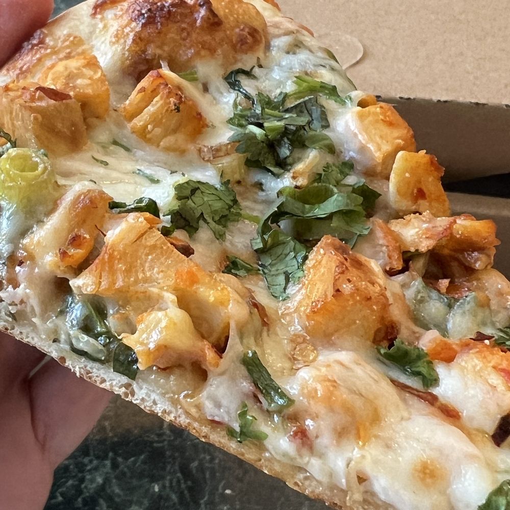 The Pizza Bakery - I like to add additional fresh cilantro on top after it's out of the oven. - Pizza Near Me - Newport Beach, California The Pizza Bakery - I like to add additional fresh cilantro on top after it's out of the oven. - Pizza Near Me - Newport Beach, California