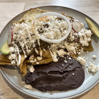 Cielito Cafe - Chilaquiles with pork rhine so good - Breakfast & Brunch Near Me - Houston, Texas