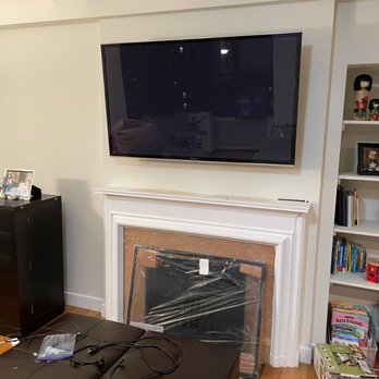 Model Home Solutions - TV Mounting (Brick) - Interior Design Near Me Model Home Solutions - TV Mounting (Brick) - Interior Design Near Me