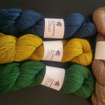 The Spinning Room - An arrangement of 4 skeins of yarn by Periwinkle Sheep (a local dyer)- blue, gold, green, & tan - Knitting Supplies Near Me - Altamont, New York The Spinning Room - An arrangement of 4 skeins of yarn by Periwinkle Sheep (a local dyer)- blue, gold, green, & tan - Knitting Supplies Near Me - Altamont, New York