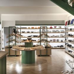 David Mellor - The circular product display table featuring kitchen items from the shop.