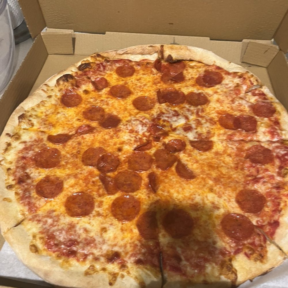 a pepperoni pizza in a box a pepperoni pizza in a box