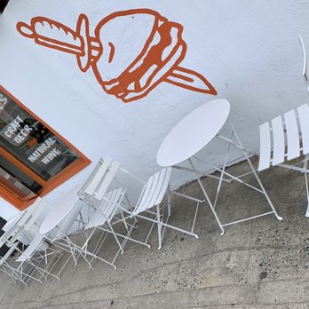 Proudly Serving - Outdoor Patio Dining (front of restaurant) - Burgers Near Me - Hermosa Beach, California