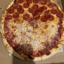 Leo's Pizza - 1/2 pepperoni 1/2 cheese.