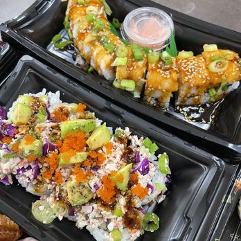 Sunfish - two trays of sushi on a table - International Grocery Near Me - Fayetteville, North Carolina Sunfish - two trays of sushi on a table - International Grocery Near Me - Fayetteville, North Carolina