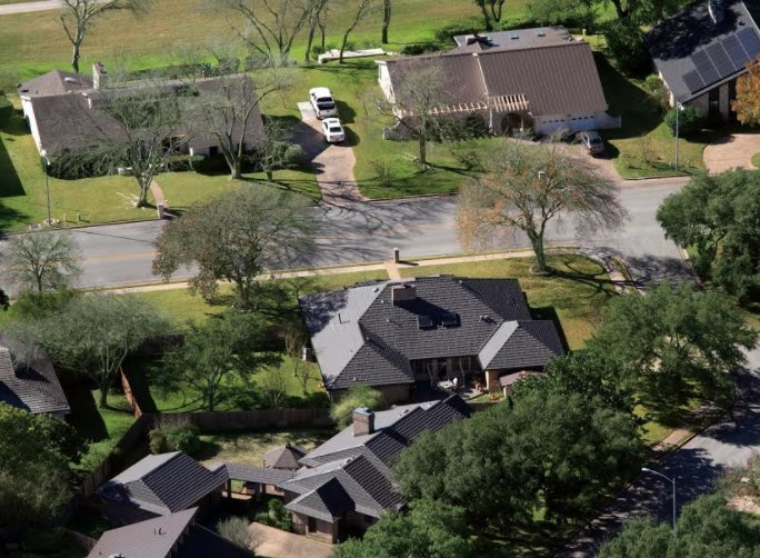 Slide of Green Knight Metal Roofing