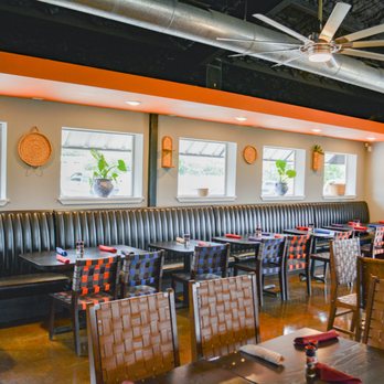 El Frias - a dining area with tables and chairs - Mexican Near Me - Lampasas, Texas El Frias - a dining area with tables and chairs - Mexican Near Me - Lampasas, Texas