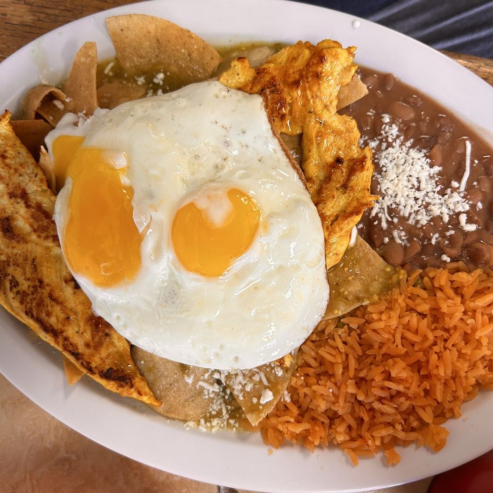 Gonzalez's Restaurant - Chilaquiles with pollo and sunny side up eggs. - Mexican Near Me - Orange, California Gonzalez's Restaurant - Chilaquiles with pollo and sunny side up eggs. - Mexican Near Me - Orange, California