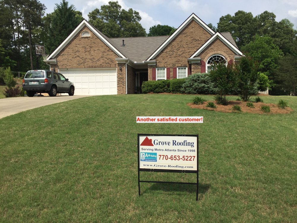 Slide of Grove Roofing