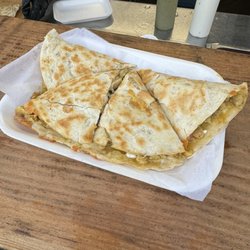 Grajeda’s Mexican Grill - Chicken quesadilla added sour cream, salsa verde, and pickled onions