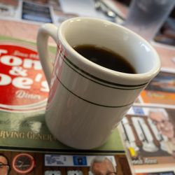 Tom & Joe's Restaurant - A small mug means your coffee won't get cold. No worries--they are quick to top it off!