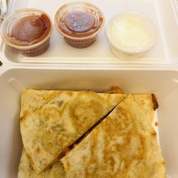 The Halal Zone - Grill Chicken Quesadilla  Don't mind the bite taken off, someone couldn't wait to eat