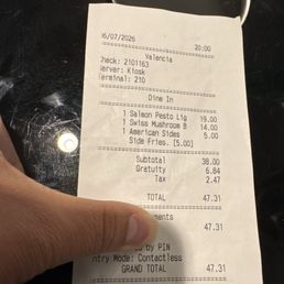 The burger tasted like cafeteria food. They charged for salmon pasta but didn't have it & no price adjustment made. The burger tasted like cafeteria food. They charged for salmon pasta but didn't have it & no price adjustment made.