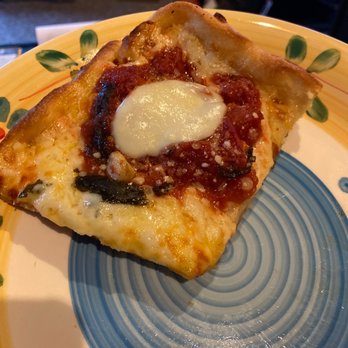 Nonna's Pizzeria - a slice of pizza on a plate - Italian Near Me - Gilbertsville, Pennsylvania Nonna's Pizzeria - a slice of pizza on a plate - Italian Near Me - Gilbertsville, Pennsylvania