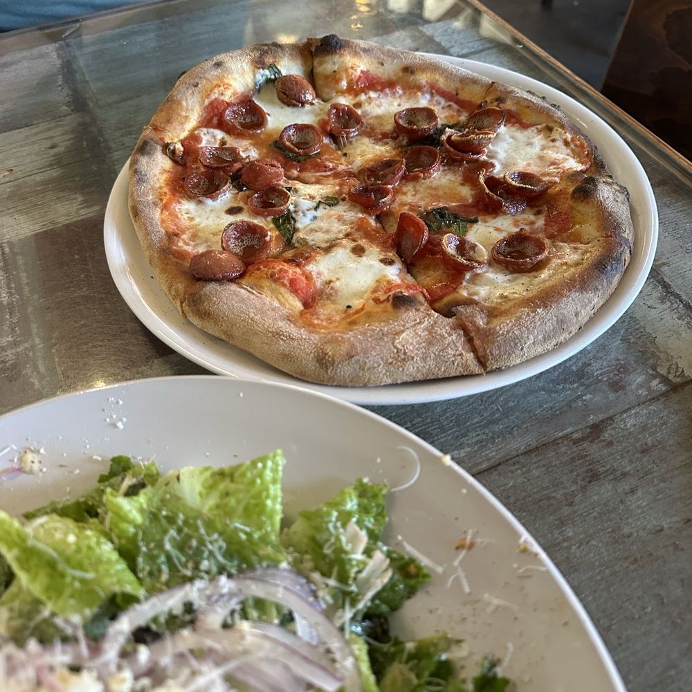 Cafe Reyes - Margherita pizza with pepperoni added and tossed green salad - Pizza Near Me - Point Reyes Station, California Cafe Reyes - Margherita pizza with pepperoni added and tossed green salad - Pizza Near Me - Point Reyes Station, California