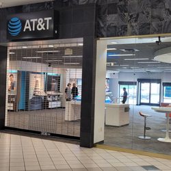 AT&T Store - The gate is down at 12:15 PM