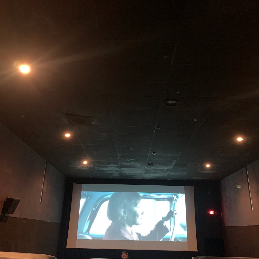 Star Cinema Grill - a man watching a movie - Dinner Theater Near Me - Conroe, Texas