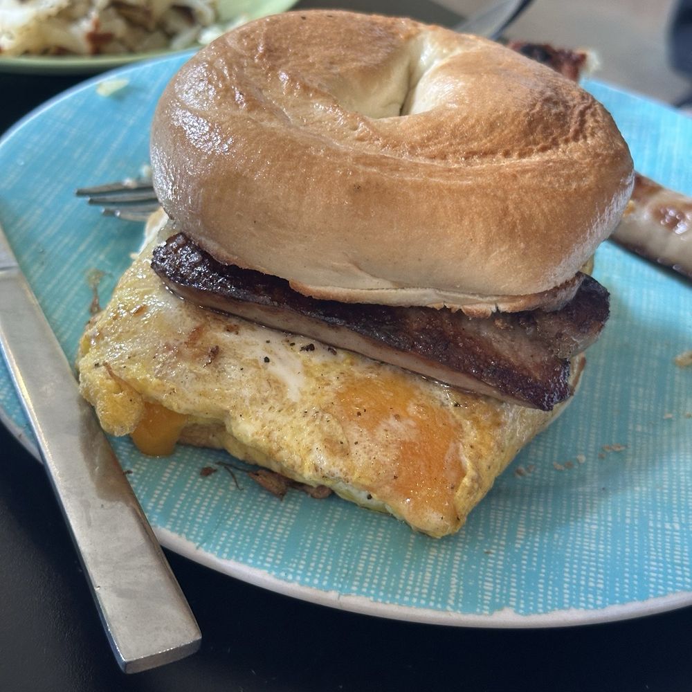 Yellowstone Grill - Bagel breakfast sandwich with sausage links cause they were out of the patties - American Near Me - Gardiner, Montana Yellowstone Grill - Bagel breakfast sandwich with sausage links cause they were out of the patties - American Near Me - Gardiner, Montana
