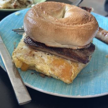 Yellowstone Grill - Bagel breakfast sandwich with sausage links cause they were out of the patties - American Near Me - Gardiner, Montana Yellowstone Grill - Bagel breakfast sandwich with sausage links cause they were out of the patties - American Near Me - Gardiner, Montana
