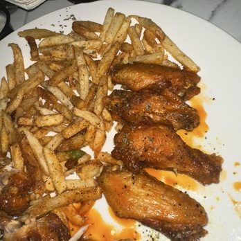 Swigzz Restaurant And Lounge - The wings were too small. 8 for $13. Fries Seasoned well but chopped up too much. These wings were the same size as American deli. - Lounges Near Me - Stockbridge, Georgia