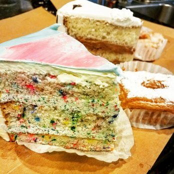 Layered Cakerie - Newest slice Rainbow cake - Bakeries Near Me - Montclair, California Layered Cakerie - Newest slice Rainbow cake - Bakeries Near Me - Montclair, California
