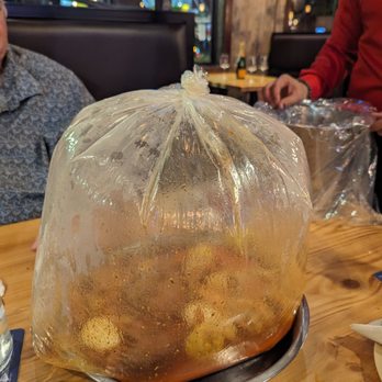 Toreros Red Crab - Opening the Bag - Seafood Near Me - Deerfield Beach, Florida