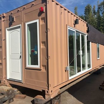 Blok Studio - Tan Container Home with amazing sliding doors and front door view - General Contractors Near Me Blok Studio - Tan Container Home with amazing sliding doors and front door view - General Contractors Near Me