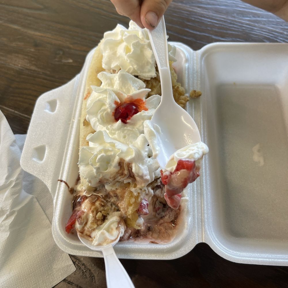 Twisters Ice Cream Cafe - Banana Split with cherry on top! - Ice Cream & Frozen Yogurt Near Me - Palm Coast, Florida Twisters Ice Cream Cafe - Banana Split with cherry on top! - Ice Cream & Frozen Yogurt Near Me - Palm Coast, Florida