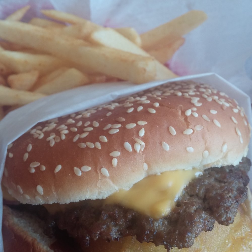 Town Burger - The western.. huge fresh onion rings, bacon, bbq sauce and cheese.. with fries and rings on the side - American Near Me - Greenfield, California Town Burger - The western.. huge fresh onion rings, bacon, bbq sauce and cheese.. with fries and rings on the side - American Near Me - Greenfield, California