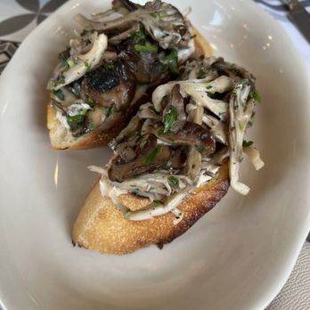 Bar 'Cino Newport - Bruschetta with pickled maitake mushrooms, parsley, oregano, and white bean purée - Bars Near Me - Newport, Rhode Island Bar 'Cino Newport - Bruschetta with pickled maitake mushrooms, parsley, oregano, and white bean purée - Bars Near Me - Newport, Rhode Island