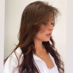 Hair extensions by Angela.
