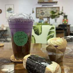 Apelu Island Cafe - White chocolate macadamia nut ice latte with ube cold foam, taro cupcake with vanilla icing and toasted coconut; spam musubi with egg