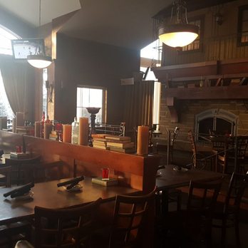 St James' Gate - dining room with a fireplace - Bars Near Me - Dieppe, New Brunswick St James' Gate - dining room with a fireplace - Bars Near Me - Dieppe, New Brunswick