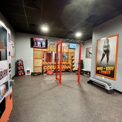 The FX Zone, complete with free weights, a Rogue rack, and our vending machine.
