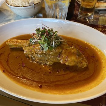 Saffron Twin Falls - Lamb shank nihari - melt in mouth meat - flavor of the sauce was complimented nicely by the micro greens, mint chutney and julienned ginger - Indian Near Me - Twin Falls, Idaho