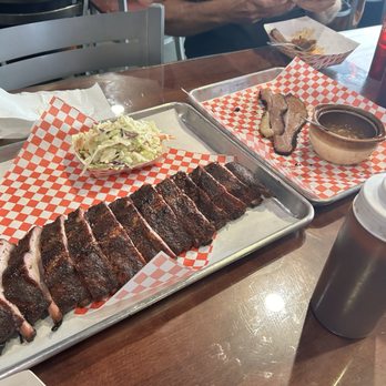 The SmoKING Ribs - Rack of ribs was large, 1lb of brisket was decent, but should have gotten 2 lbs, it went fast, most was gone by the time I took this pic - Caterers Near Me - Garden Grove, California