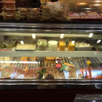 Kabab Paradise - This is their cooler where their food marinates and desserts on top - Afghan Near Me - South Bound Brook, New Jersey Kabab Paradise - This is their cooler where their food marinates and desserts on top - Afghan Near Me - South Bound Brook, New Jersey