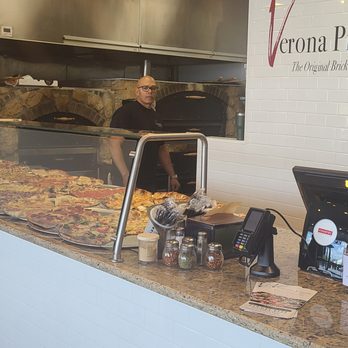 Verona Pizza - a woman working behind a counter - Sandwiches Near Me - Maple Glen, Pennsylvania Verona Pizza - a woman working behind a counter - Sandwiches Near Me - Maple Glen, Pennsylvania