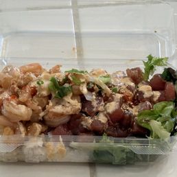 Half Shrimp, half tuna, with rice and greens Half Shrimp, half tuna, with rice and greens