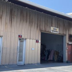 Aloha Upholstery - Entrance up the driveway, equidistant from left or right turn once you get up the ramp in the back.