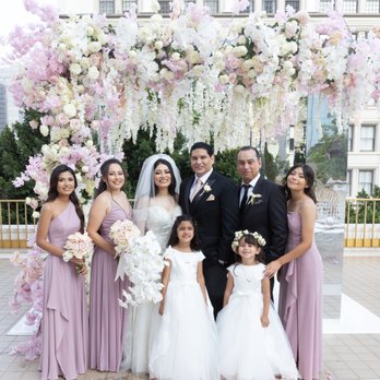 Nahid's Global Events - Hanging roses and orchids on mirrored collumns... - Wedding Planning Near Me - San Diego, California