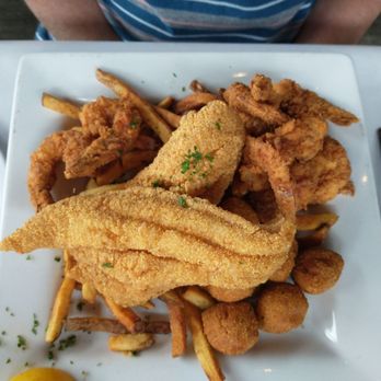Shell Shack - The Boss platter; fried catfish, fried shrimp, hush puppies, and fries - Seafood Near Me - Plano, Texas Shell Shack - The Boss platter; fried catfish, fried shrimp, hush puppies, and fries - Seafood Near Me - Plano, Texas