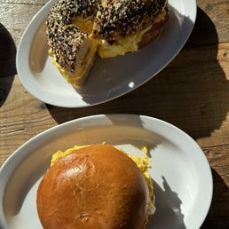 Bacon egg bagel and brioche egg sandwich